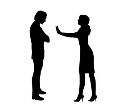 Silhouette of woman stop man