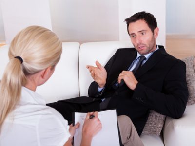 Man talking to his psychiatrist