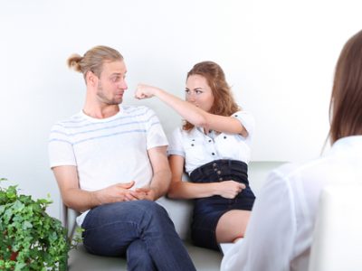 Young couple with problem on reception for family psychologist